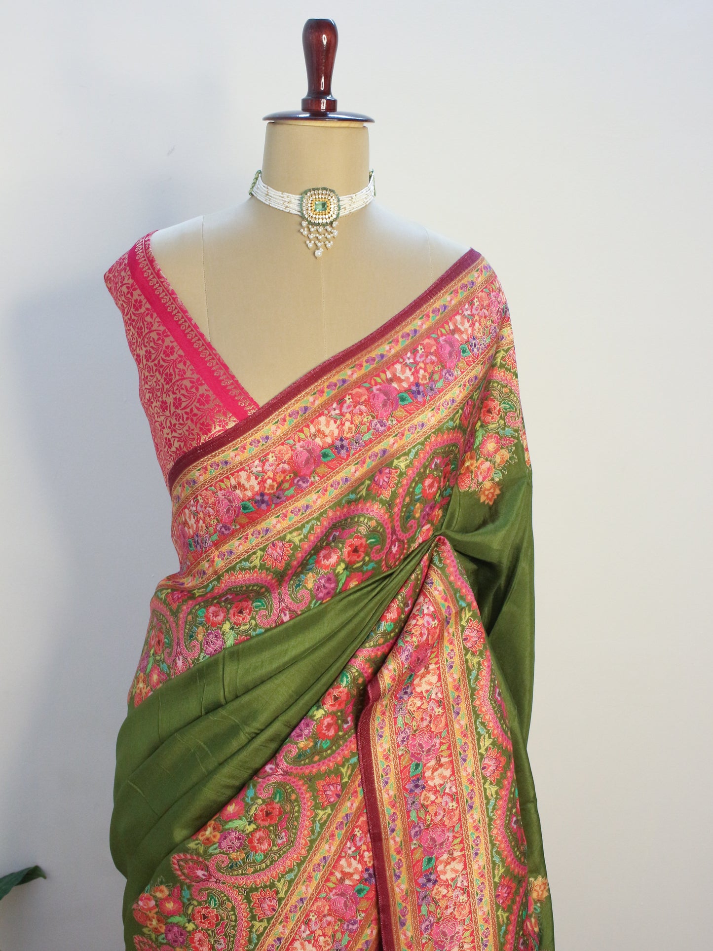 Henna green Kashmiri emporium Kanni Silk Saree with Multicolor Floral Weave