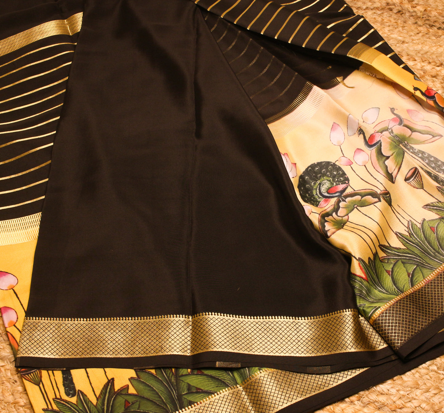 Black Mysore Silk Crepe Saree with printed Lotus & Peacock border.