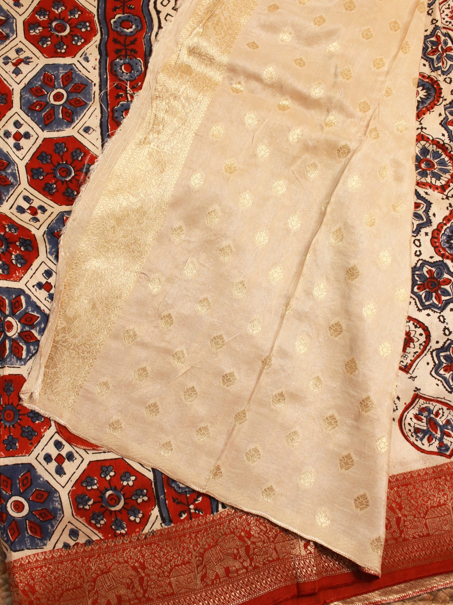 Beige Hand Block Print pure Dola Silk Saree with brick red traditional flower motifs-Golden Elephant Zari Border