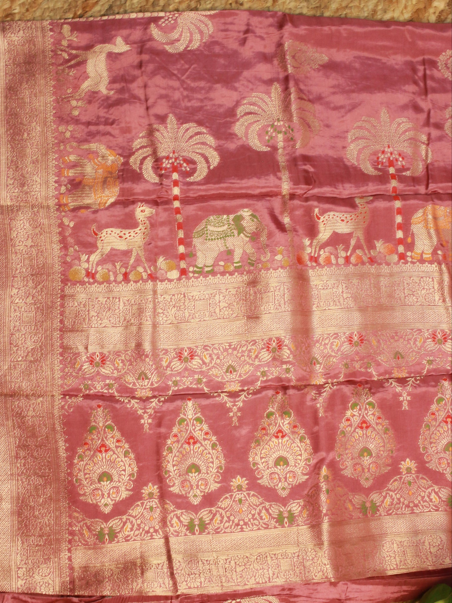 Onion Pink Russian Silk Saree with Woven Animal & Nature Motifs