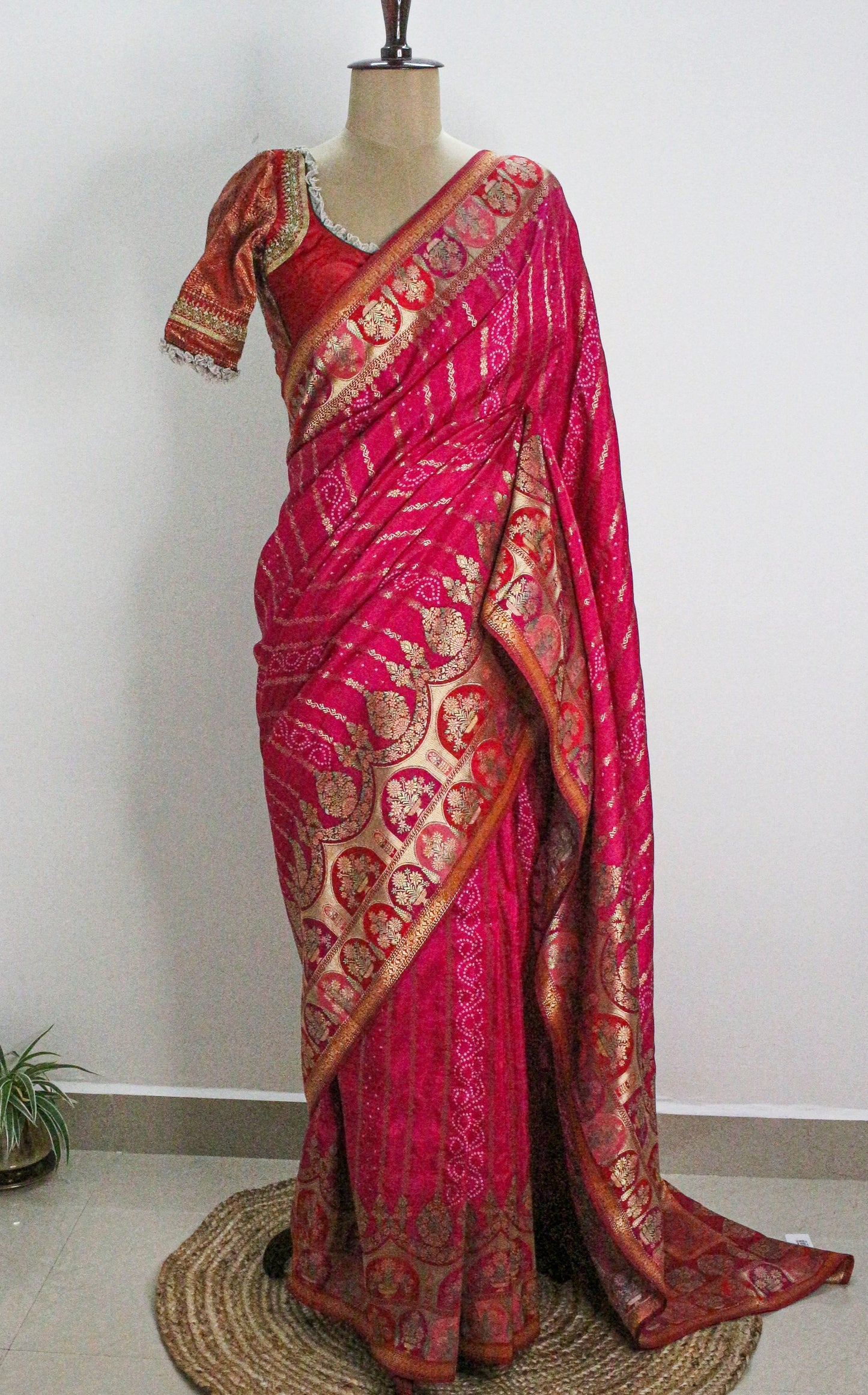 Rani pink Kani Silk Saree with Bandhani Design & Gold Zari Weaving