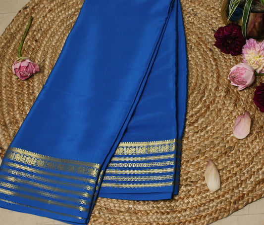 Kerosene Blue Mysore Silk Crepe Saree with Gold Zari Striped Border