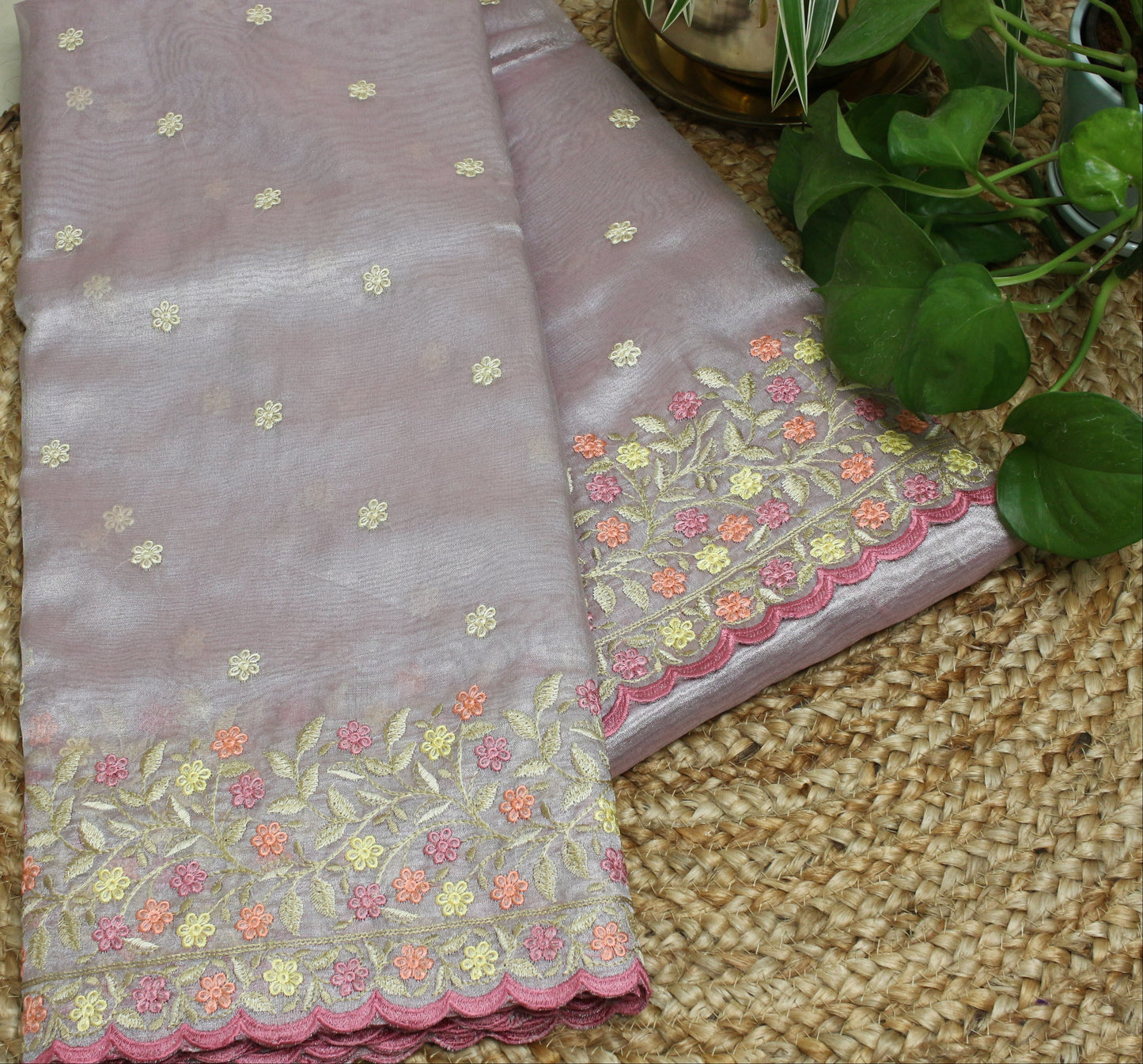 Pastel pink soft Tissue Saree with Delicate Floral Embroidery