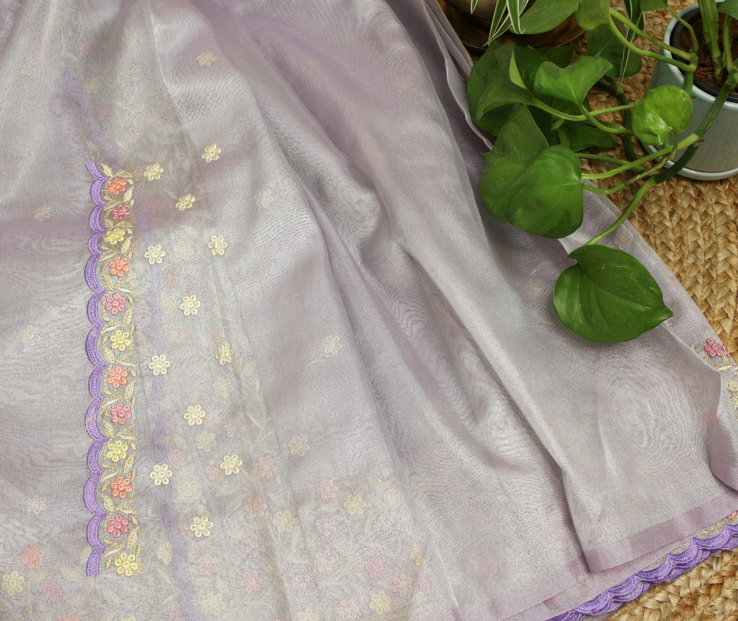 Lavender soft Tissue Saree with Delicate Floral Embroidery