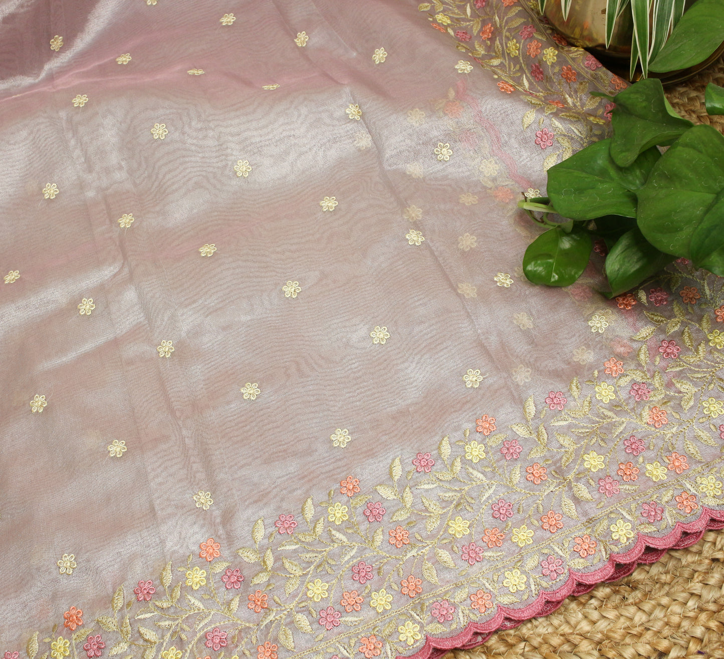 Pastel pink soft Tissue Saree with Delicate Floral Embroidery