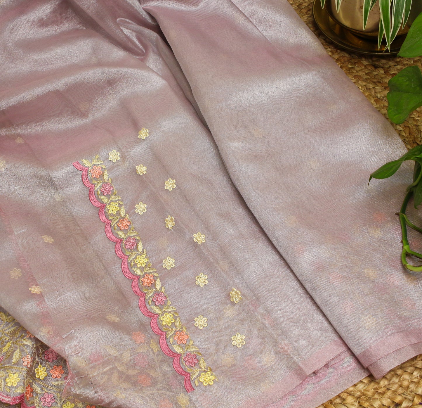 Pastel pink soft Tissue Saree with Delicate Floral Embroidery