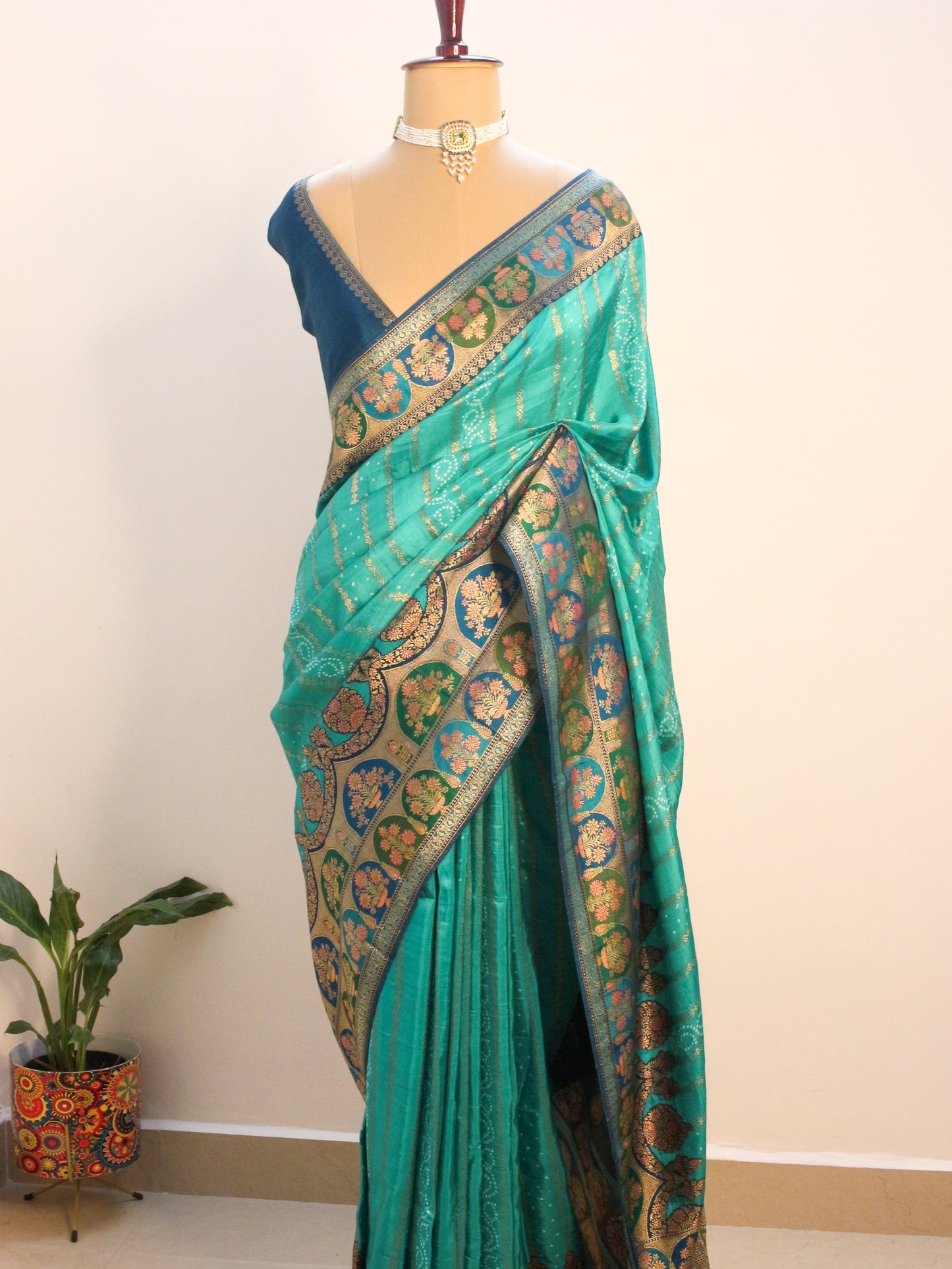 Sea green Kani Silk Saree with Bandhani Design & Gold Zari Weaving