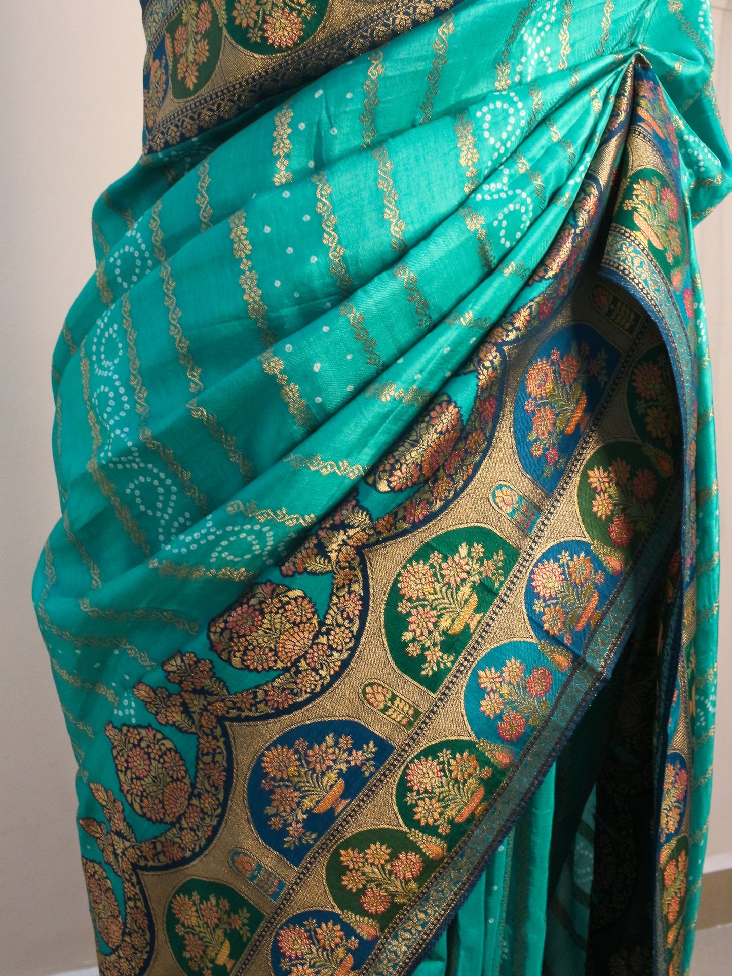 Sea green Kani Silk Saree with Bandhani Design & Gold Zari Weaving