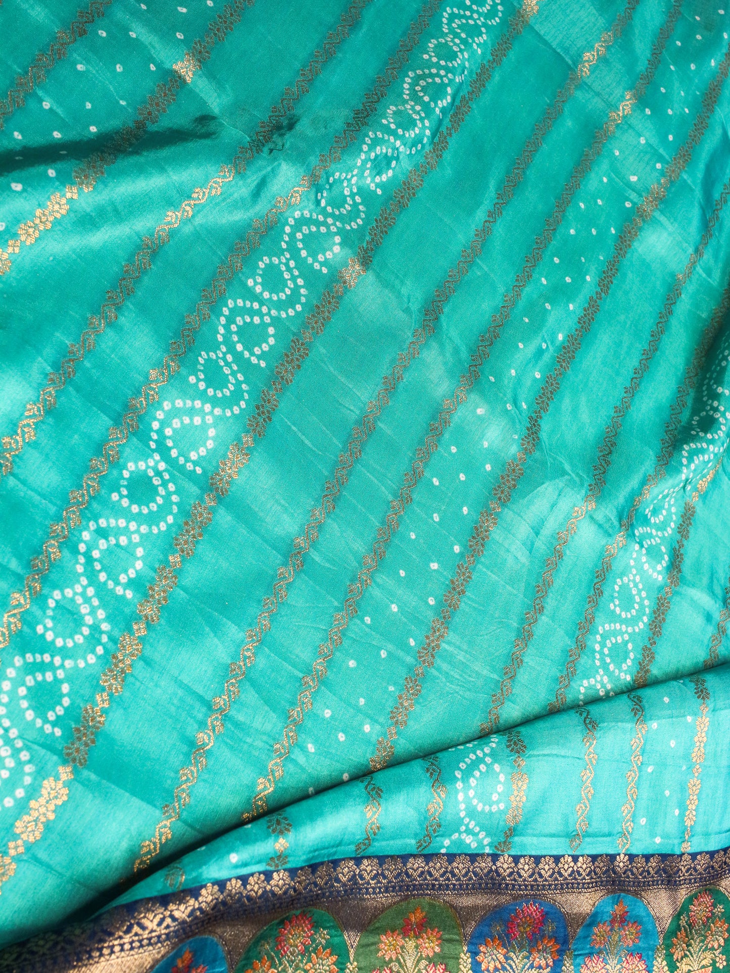 Sea green Kani Silk Saree with Bandhani Design & Gold Zari Weaving