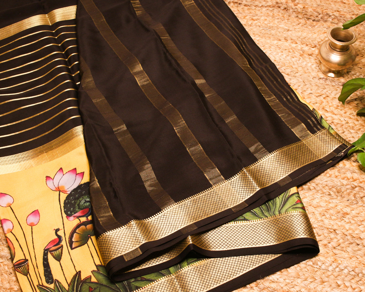 Black Mysore Silk Crepe Saree with printed Lotus & Peacock border.