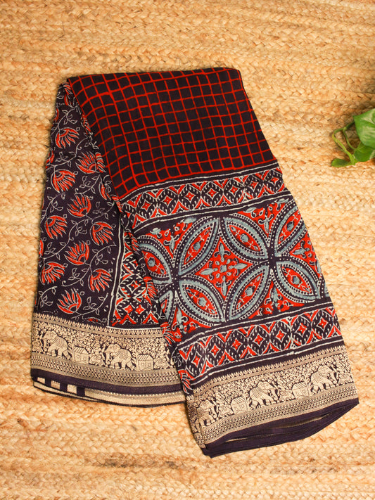 Pure Dola Silk Saree with wooden hand block Ajrakh Prints on Navy blue saree