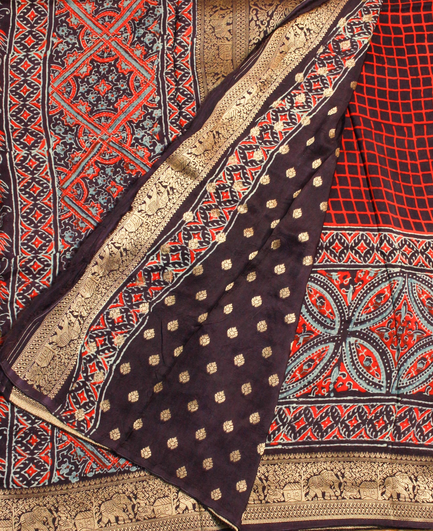 Pure Dola Silk Saree with wooden hand block Ajrakh Prints on Navy blue saree