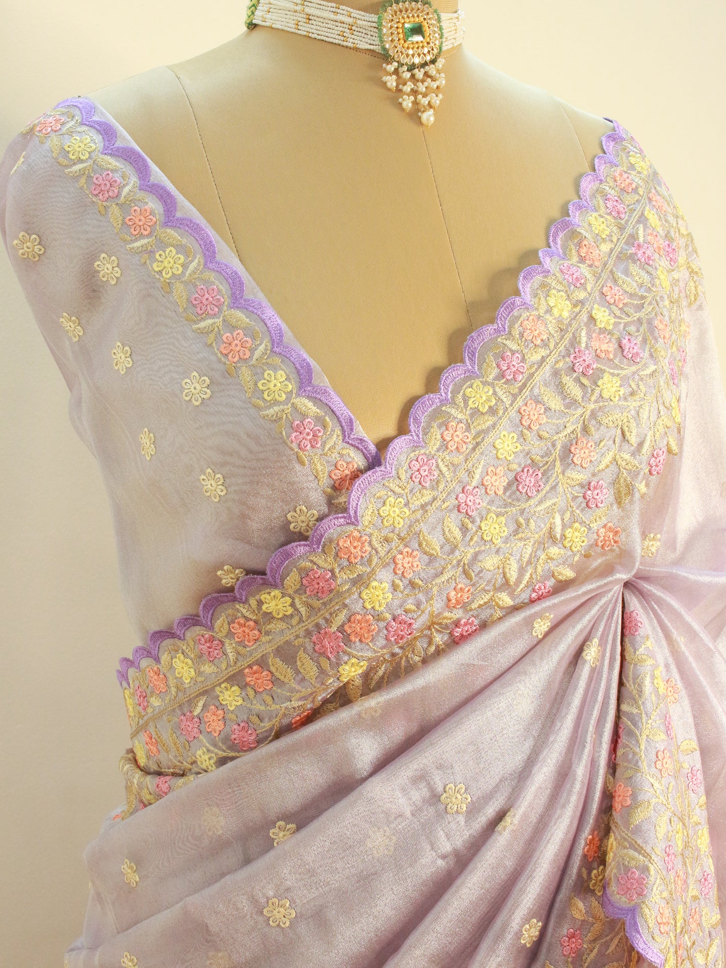 Lavender soft Tissue Saree with Delicate Floral Embroidery